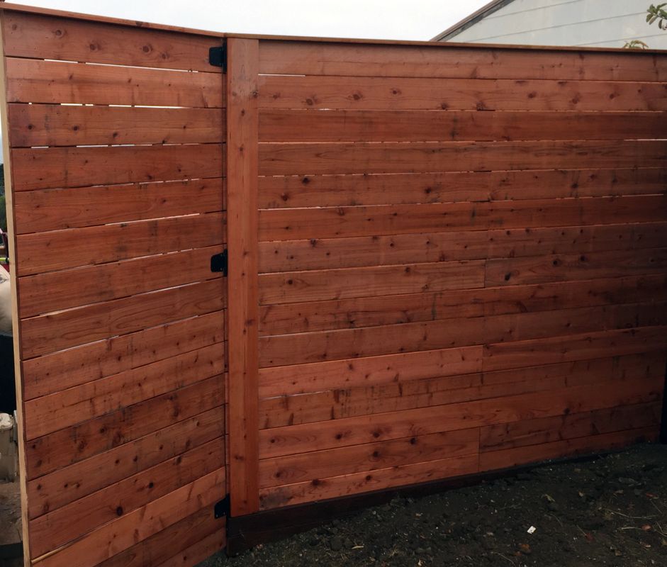 Horizontal cedar fence with gate