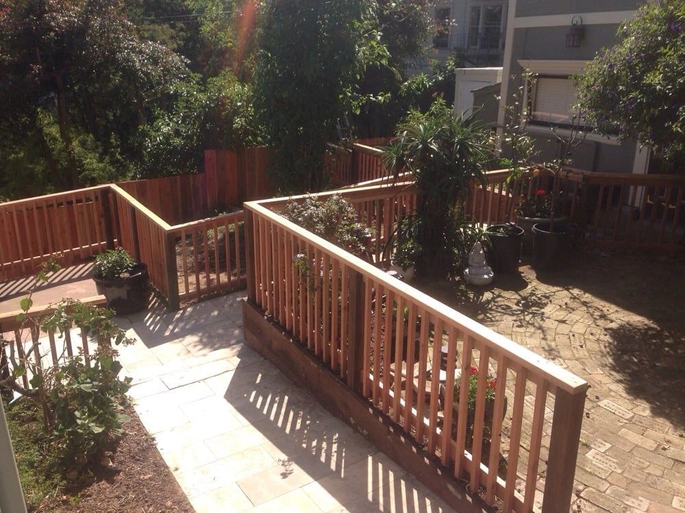 Decorative wood railing with planters